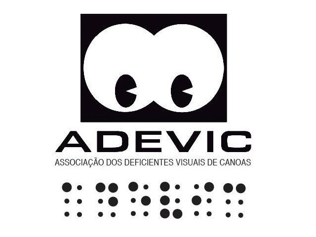 Início da descrição. No canto superior esquerdo tem a logo do site ADEVIC: Fundo branco; no centro, o desenho de dois olhos, estilizado. Os olhos estão desenhados com formas geométricas; a pupila, no centro, são círculos ovais com triângulo. Abaixo, a palavra ADEVIC está escrita no centro, em letras maiúsculas, em preto e no tamanho grande. Abaixo dela, também no centro, as palavras Associação dos deficientes visuais de canoas, escritas em tamanho menor, na cor preto. Fim da descrição